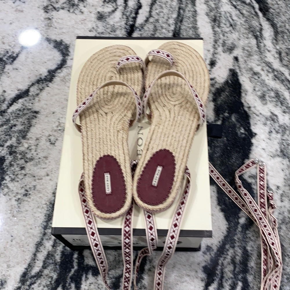 Woven sandal wraps around ankle